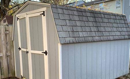 shed before demo & removal in PBG backyard by fence